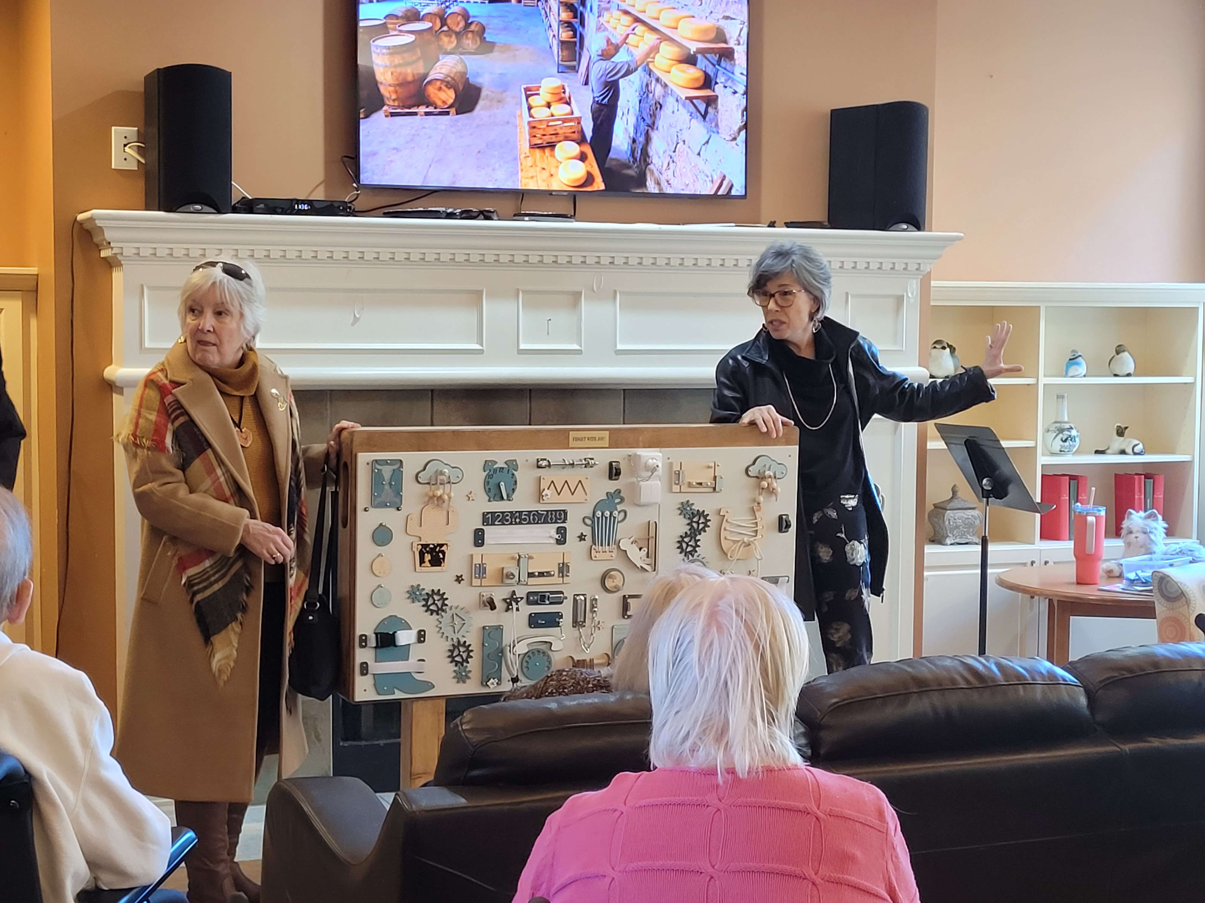 Client presenting the fidget board frame at Waverly - photo 1