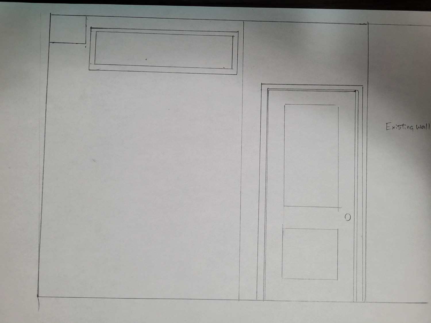 Final side view: the hinged door and glass above the wall.