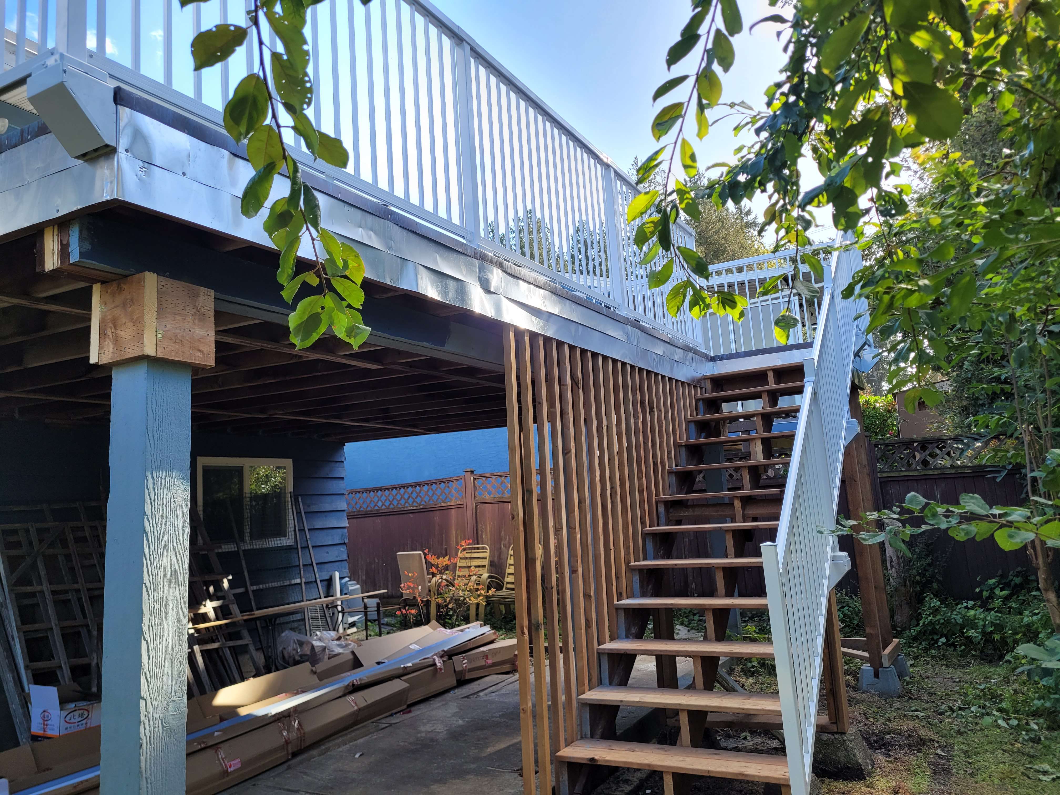 Stair design showing combination of wood and aluminum railing