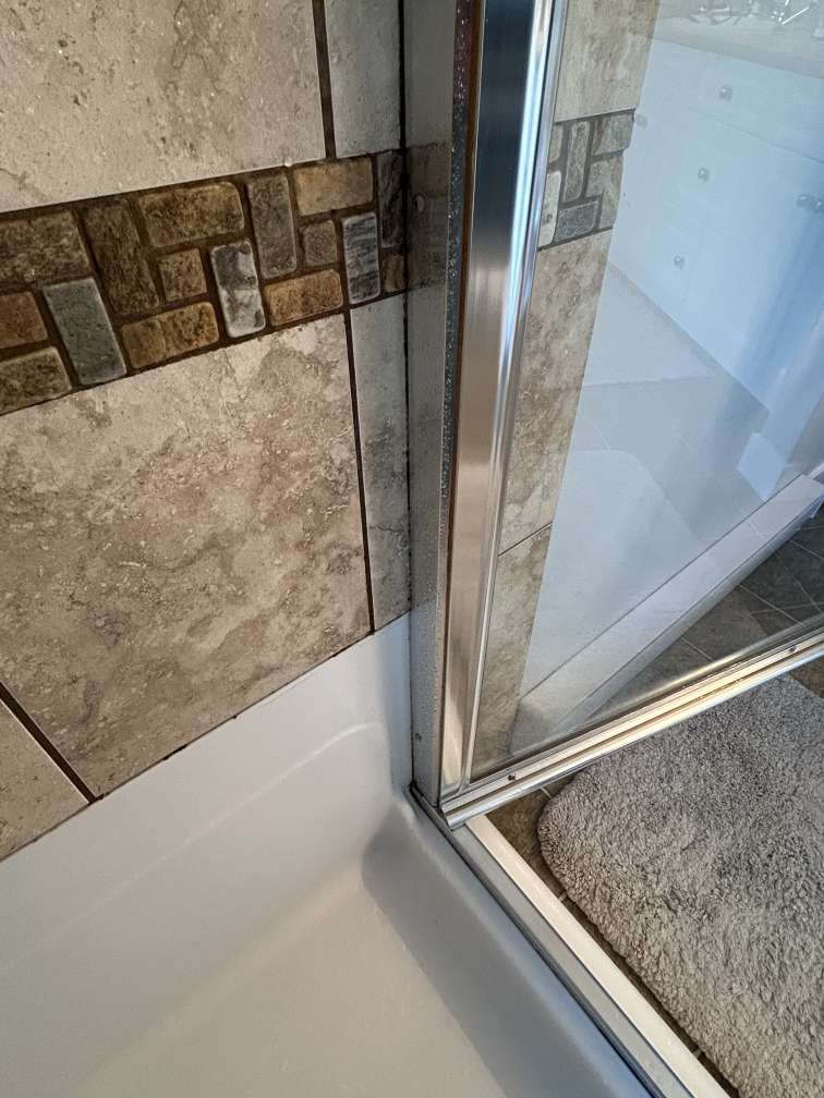 Before: mould‑stained silicone