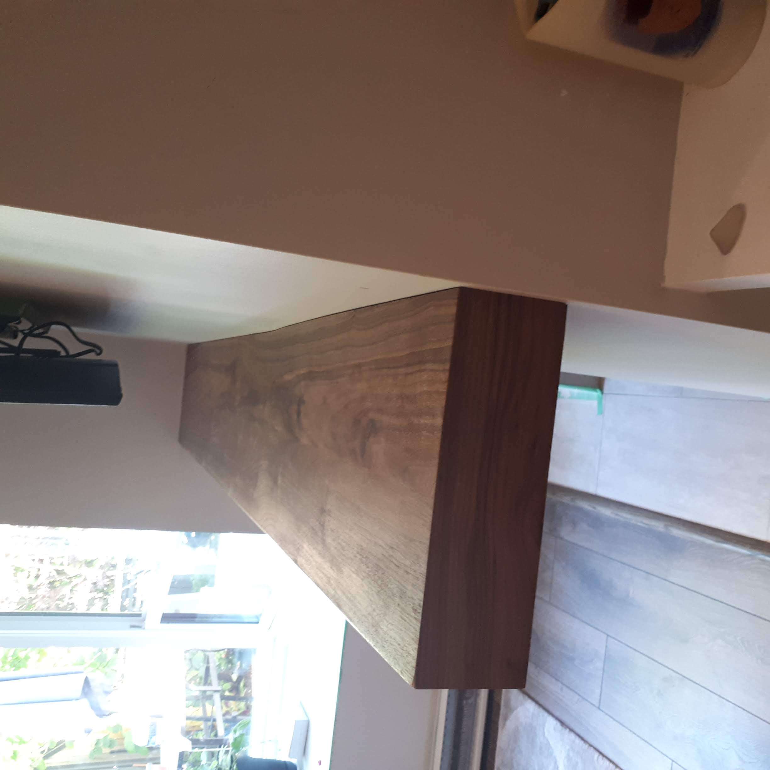 Custom carpentry project - Custom wall mantle with walnuts 2
