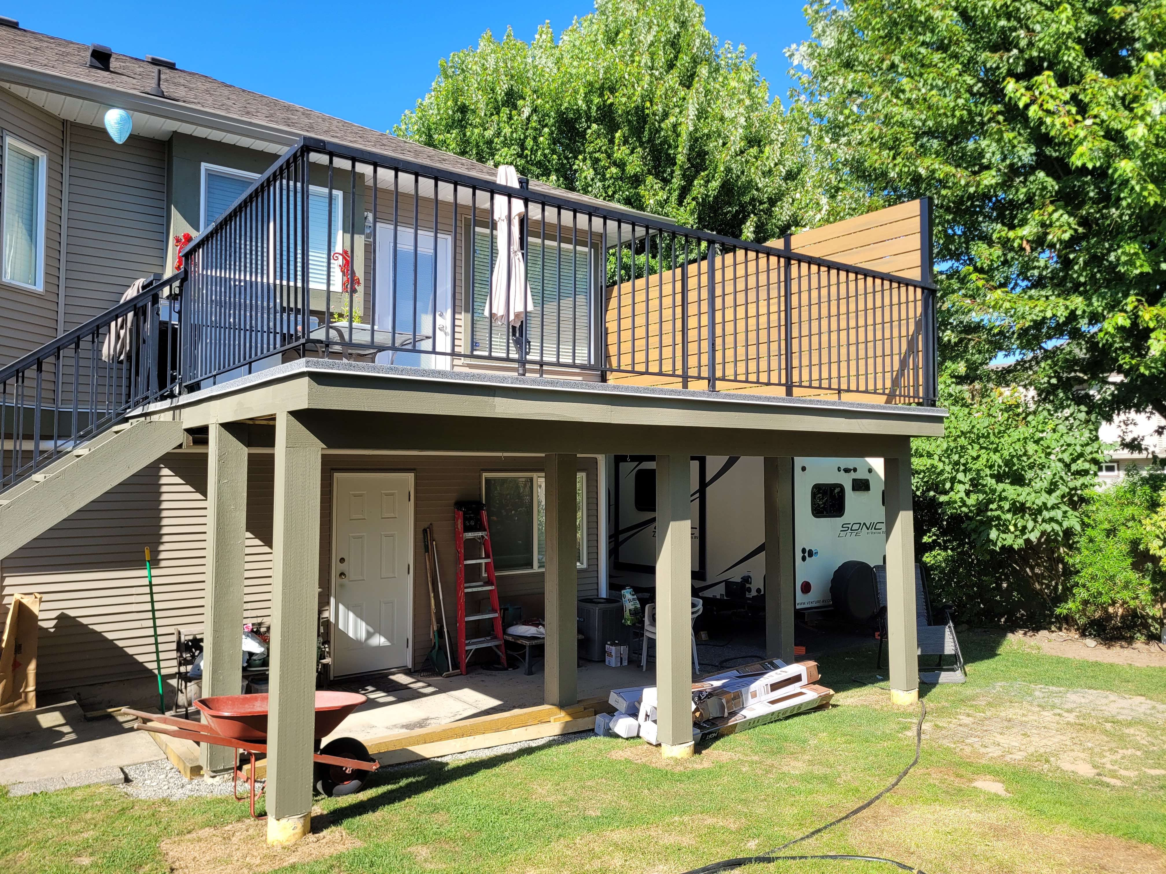 Deck project - Deck extension for more outdoor space & privacy railing.