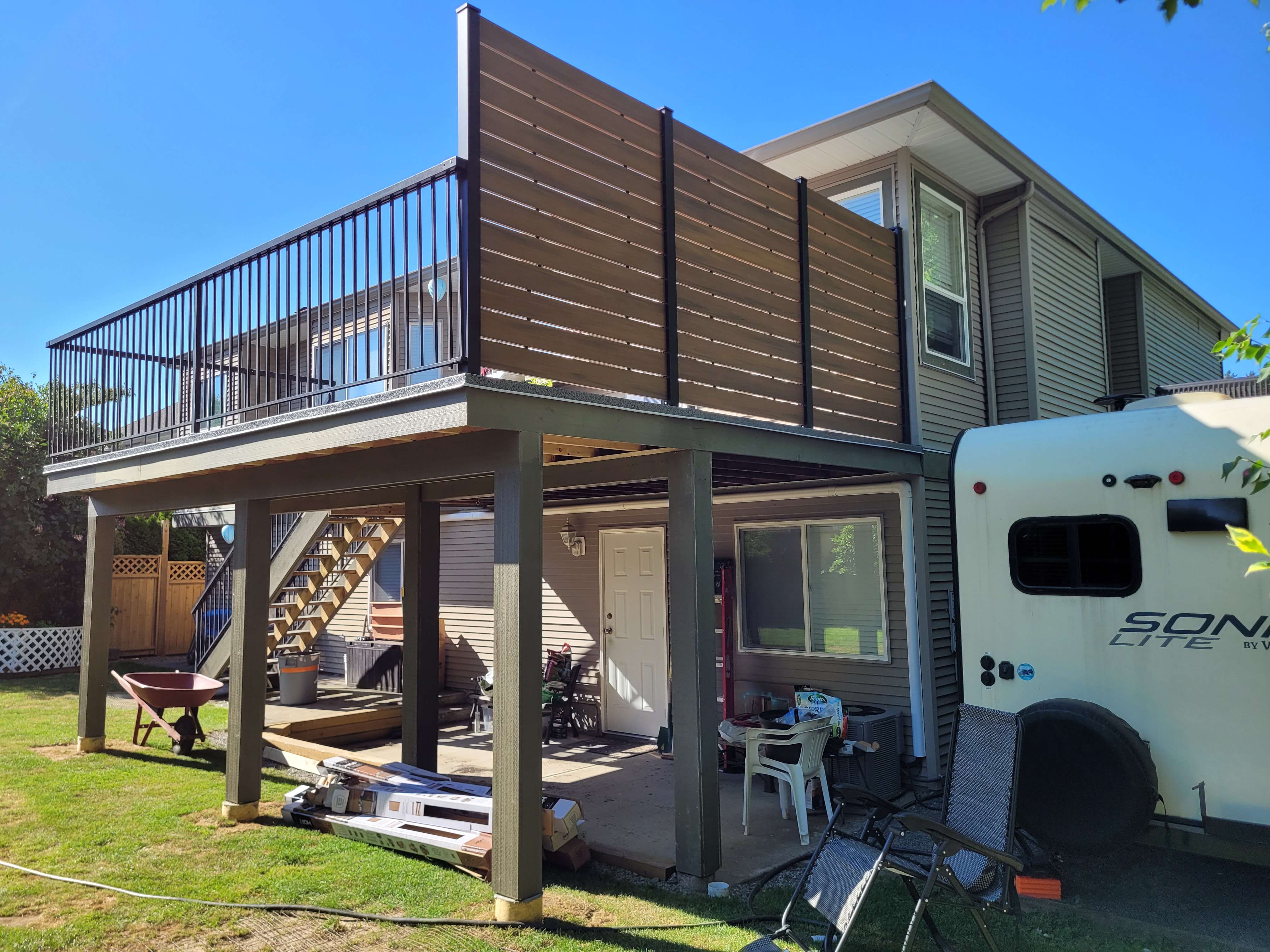 Deck project - Deck extension for more outdoor space & privacy railing.